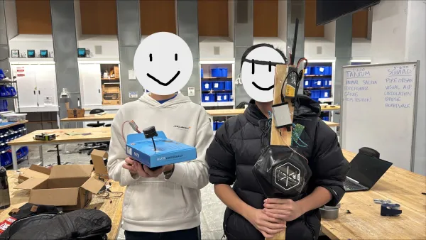 Box with a transmitter, and a stick with receivers on it.